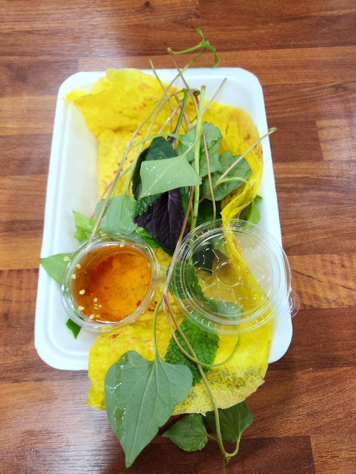 Banh xeo is served in a bowl