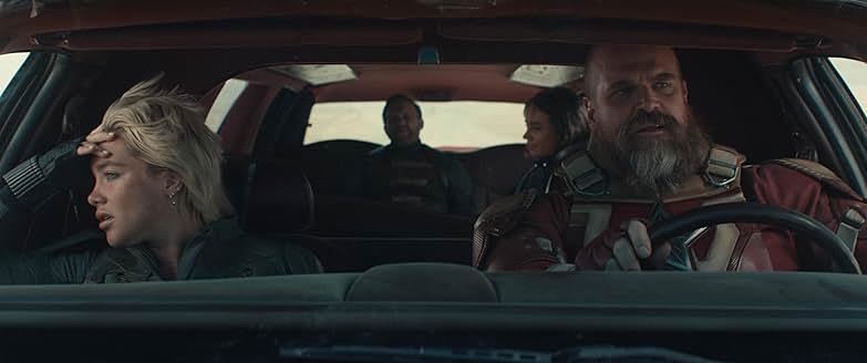 자동차 안에서 Thunderbolts 팀원들이 대화하는 모습