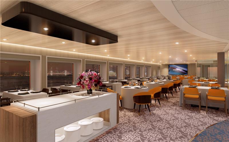 “팬스타미라클호의 고급 레스토랑 내부 전경. 넓은 공간에 원형과 사각형 테이블이 정갈하게 배치되어 있으며, 창밖으로는 야경과 다리 조명이 보인다. 중앙에는 꽃 장식이 놓인 서비스 테이블이 있고, 전체적으로 따뜻한 조명과 우아한 인테리어가 어우러져 고급스러운 분위기를 연출한다.”