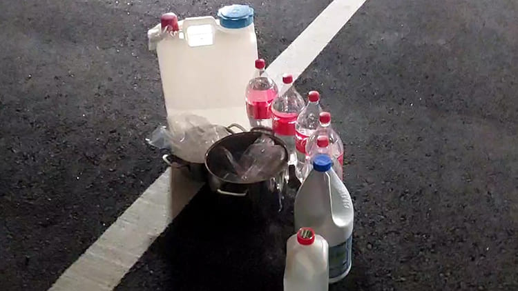 Some of the plastic bottles, detergent canisters, milk jugs, and oil drums believed to have been used to make IEDs were found.