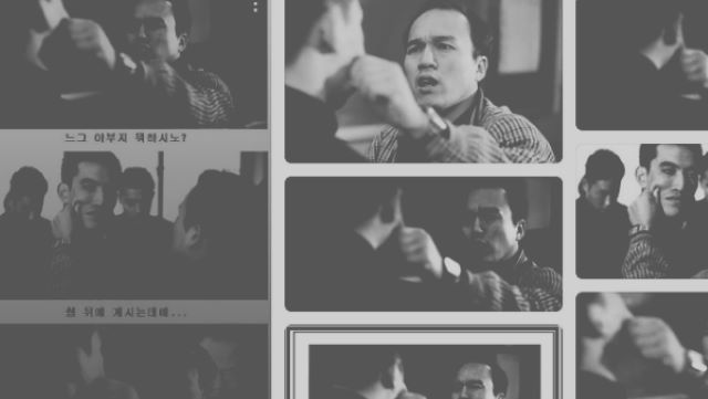 영화 친구의 한 장면으로 주인공 유오성을 선생님이 얼굴을 잡고 때리려고 하고 있다.
