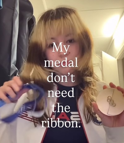 금메달 깨무는 이유