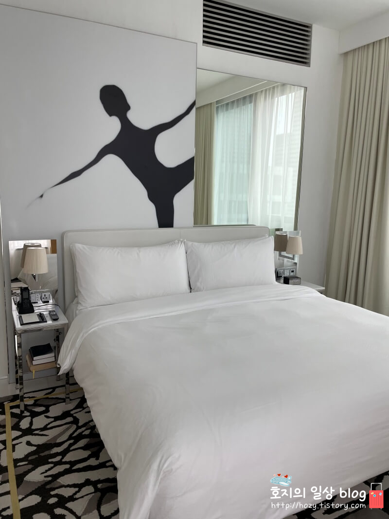 JW메리어트 싱가포르 디럭스 스위트룸 침실