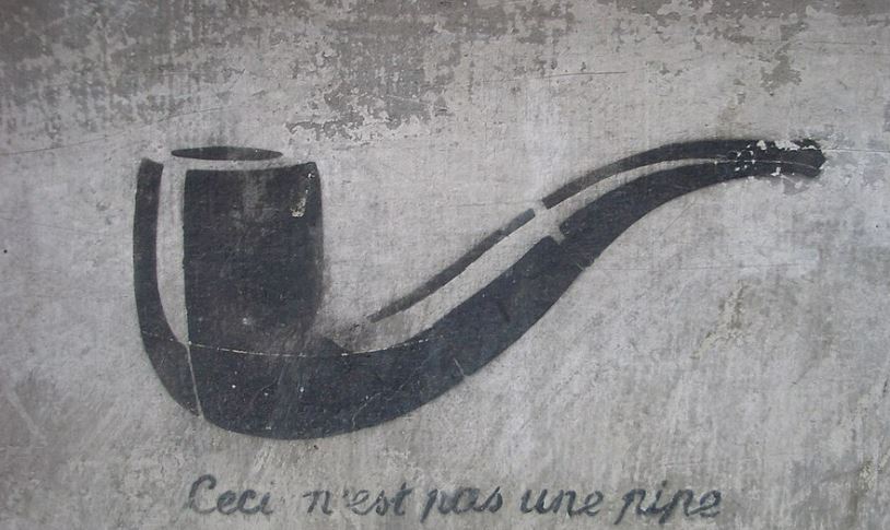 마그리트의 대표작 <이미지의 배반>