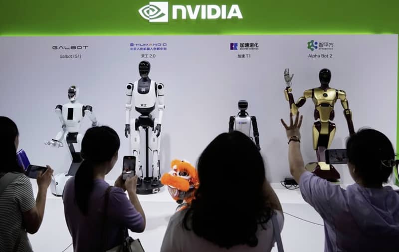 Nvidia booth robots get commands at an event in China. Nvidia shares gained 1.4% but have come under pressure recently. Mahesh Kumar A./Associated Press