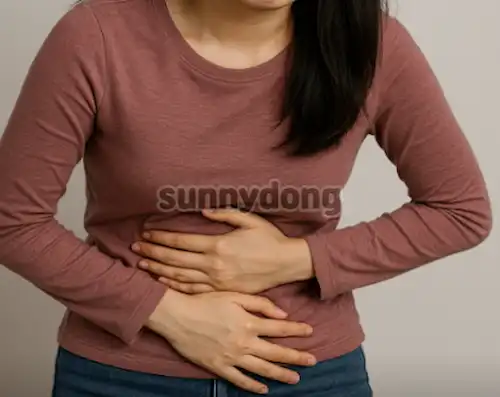 복통 호소 장면
