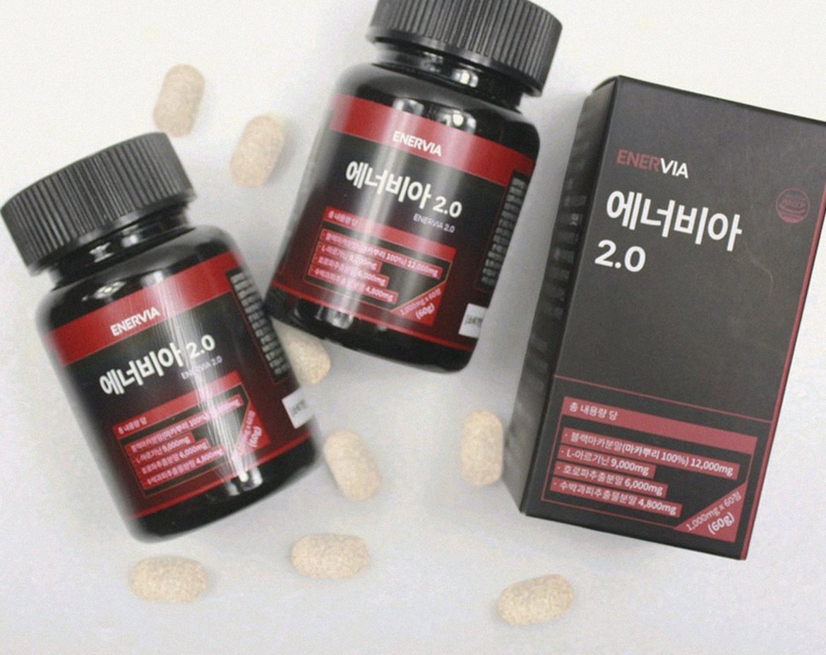 Korean Asian businessman 46 morning routine taking supplement with breakfast