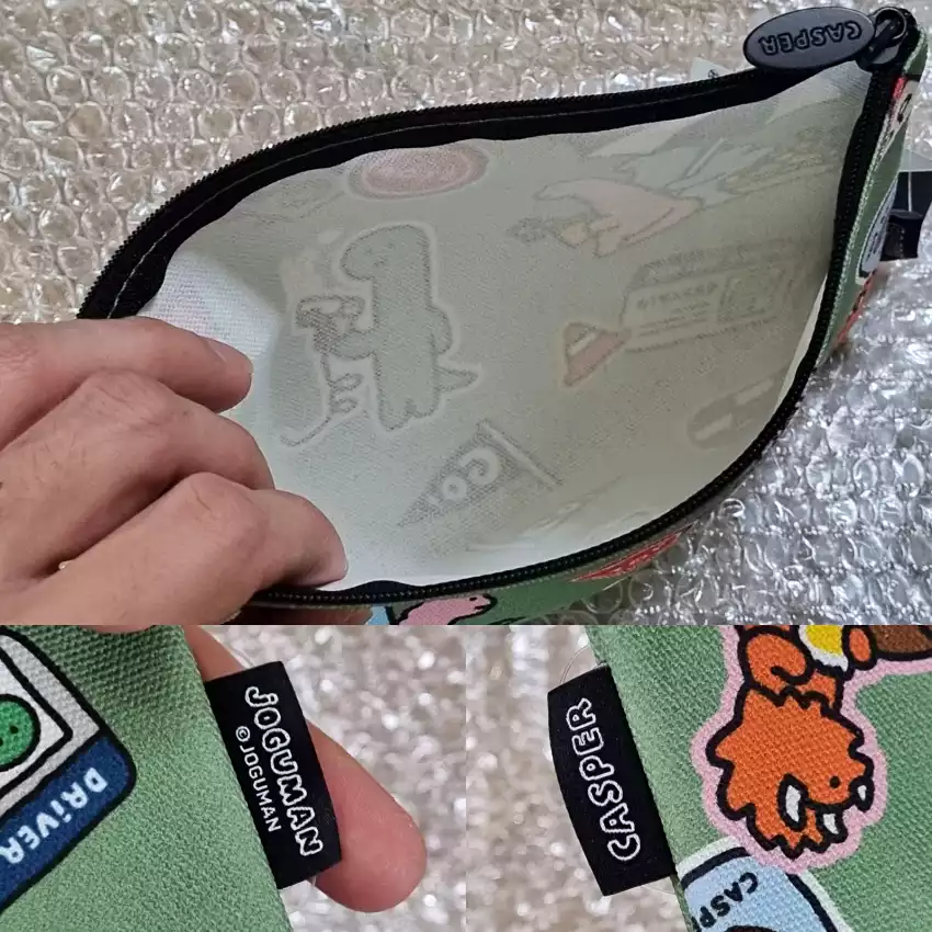 캐스퍼 조구만 패브릭 파우치를 살핀 모습입니다.