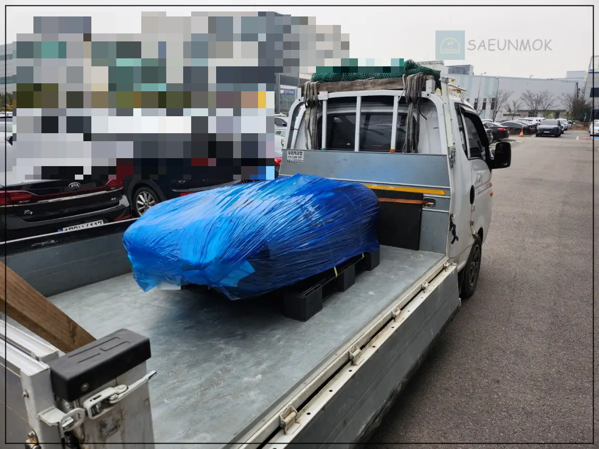 용달-트럭에-물건을-싣는-사진-1