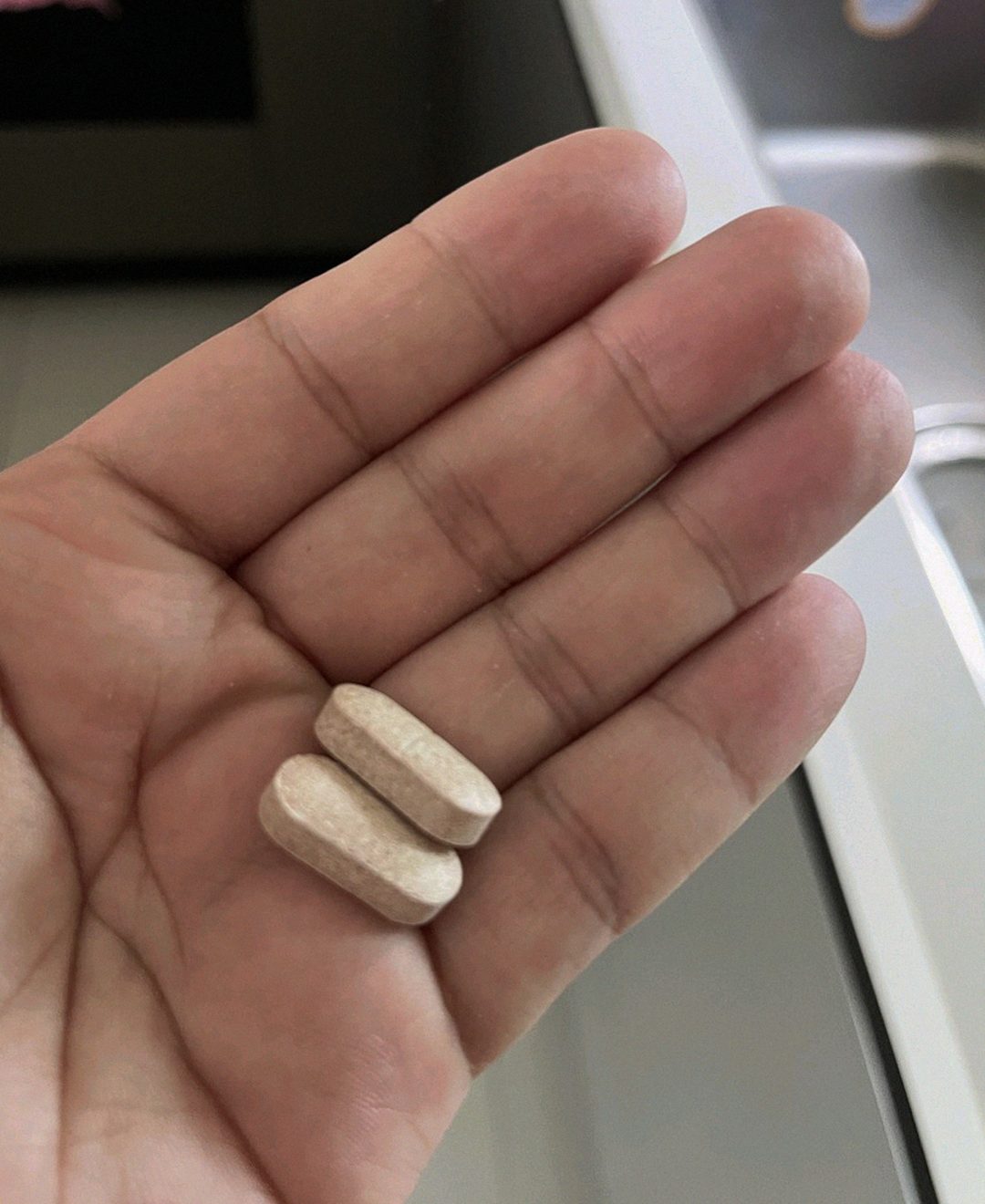 enervia tablets on palm size comparison