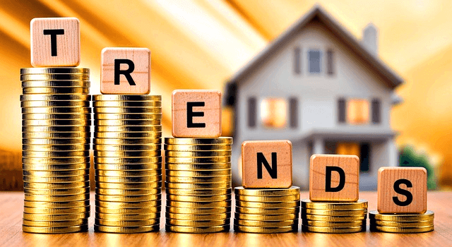 금화들도 쌓인 6개의 금화탑들이 계단식으로 즐비하다. 맨 위에는 영문자로 TRENDS가 적힌 나무조각들이 있다.