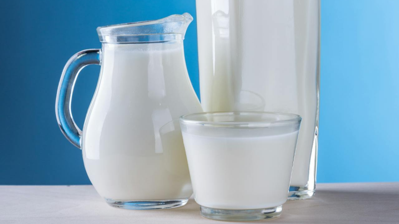 Milk jug, milk in glass bowl