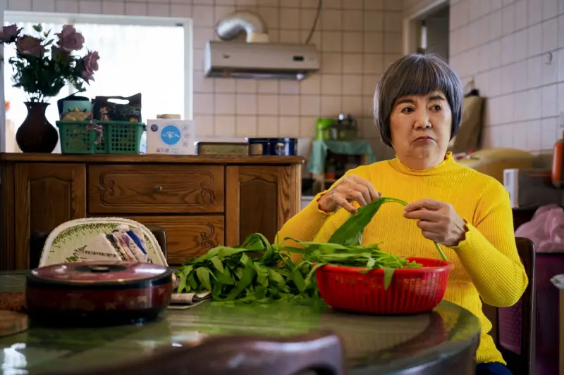 마오첸 아란을 연기하는 왕만교