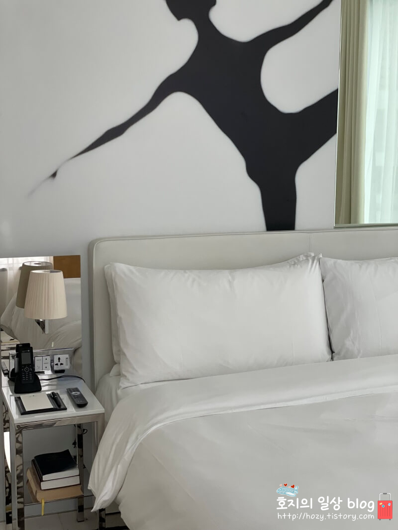 JW메리어트 싱가포르 디럭스 스위트룸 침대모습