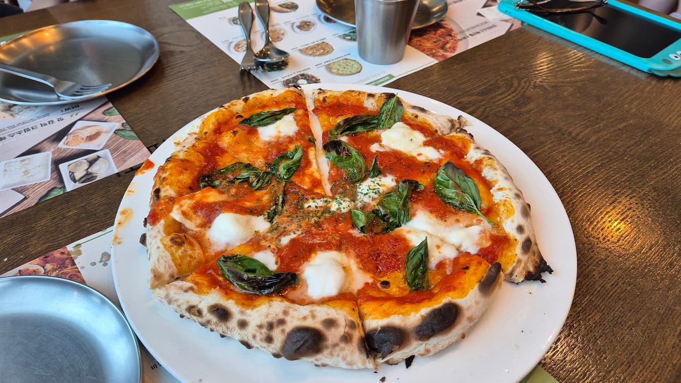 꽃피는 화덕 피자 가게 사진 피자 사진