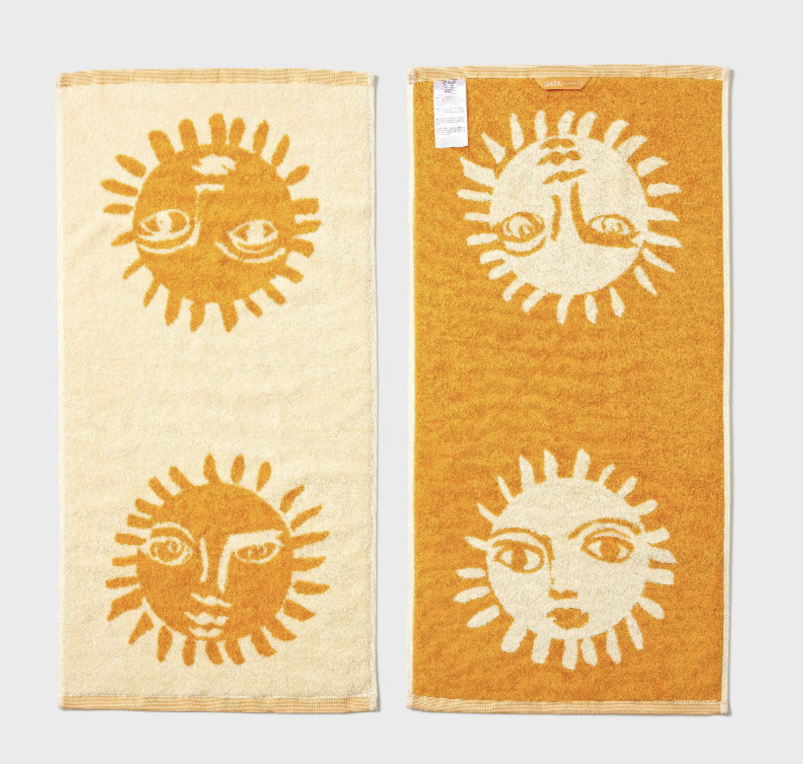 해가 그려진 주황색 수건 앞면 뒷면