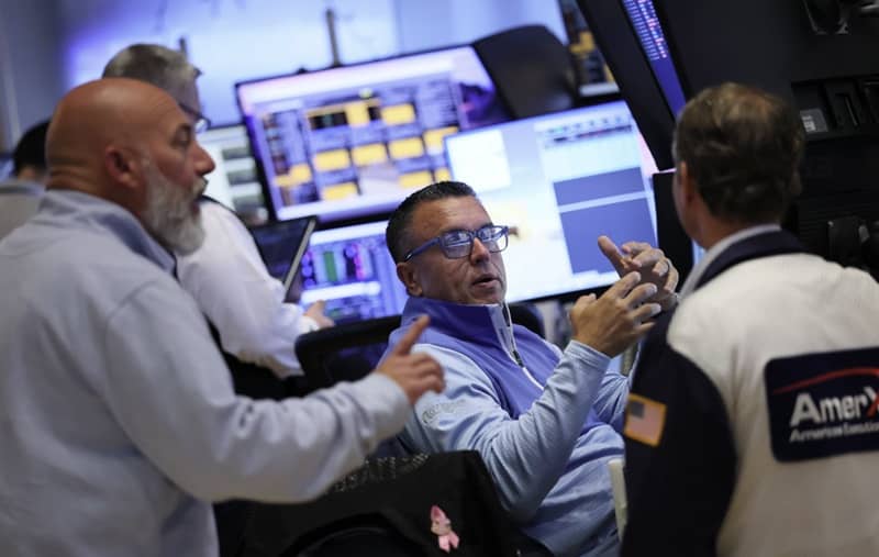 Investors also digested a flurry of third-quarter earnings from Wall Street. Michael M. Santiago/Getty Images