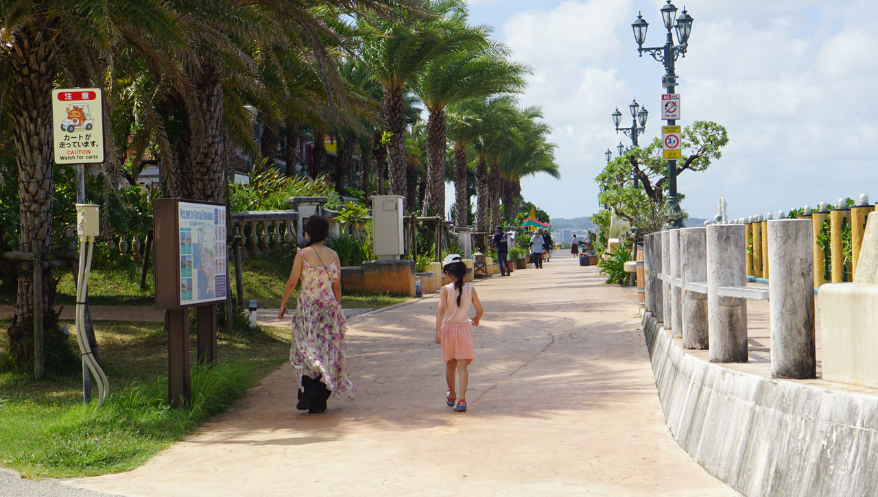 Take a walk while looking at the American Village beach.