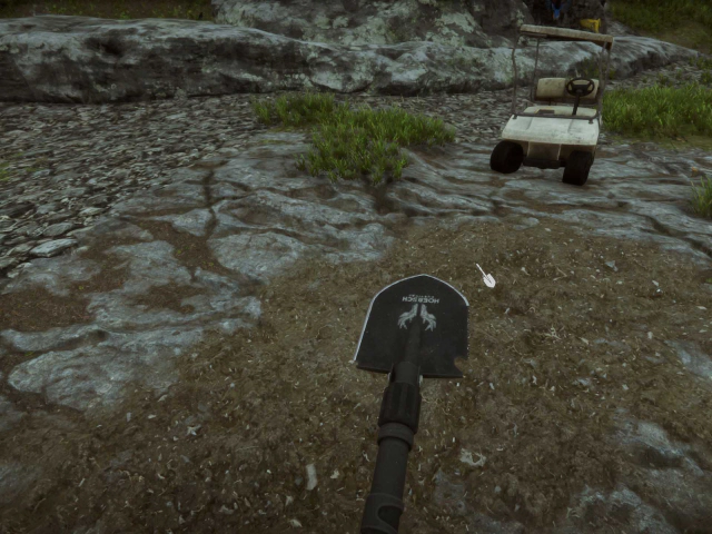 삽으로 흙은 퍼내려는 모습