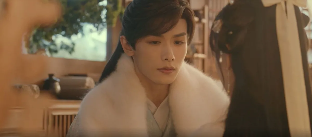 흰옷을-입고-앉아있는-능장풍