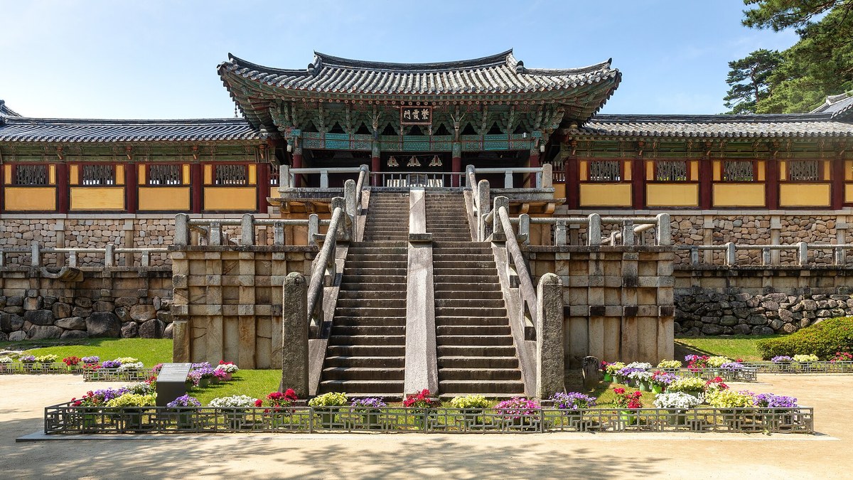 Stone stairways and wooden halls at the entrance of Bulguksa Temple in Gyeongju on a clear day