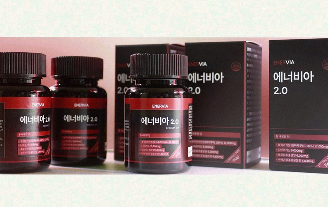 Korean Asian man 39 years old trainer researching supplements at home evening