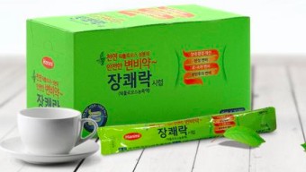 장쾌락-상자와-1포-그리고-찻잔이-있는-사진입니다.