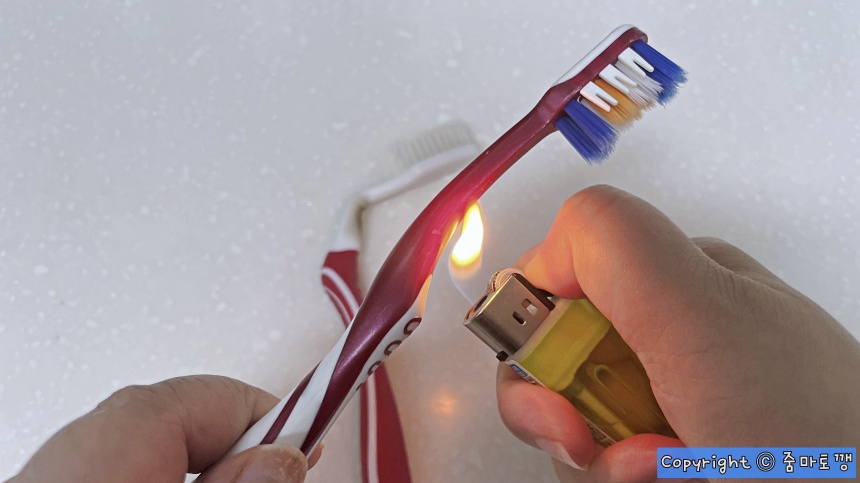 라이터로-열-가하기