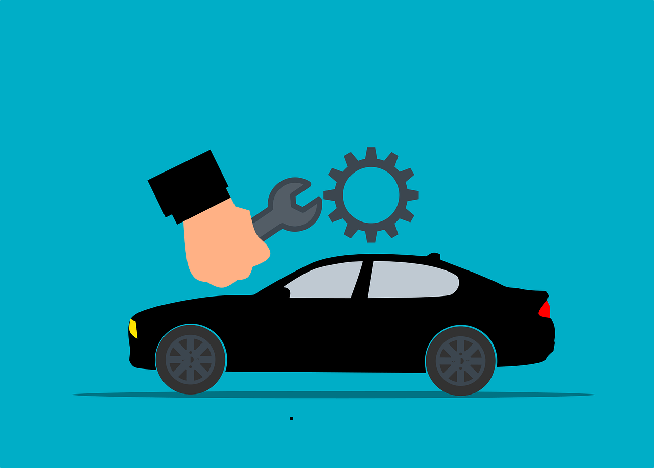 파란색 바탕에 검은색 자동차와 스패너를 든 손 하나와 톱니바퀴 하나가 그려져 있다