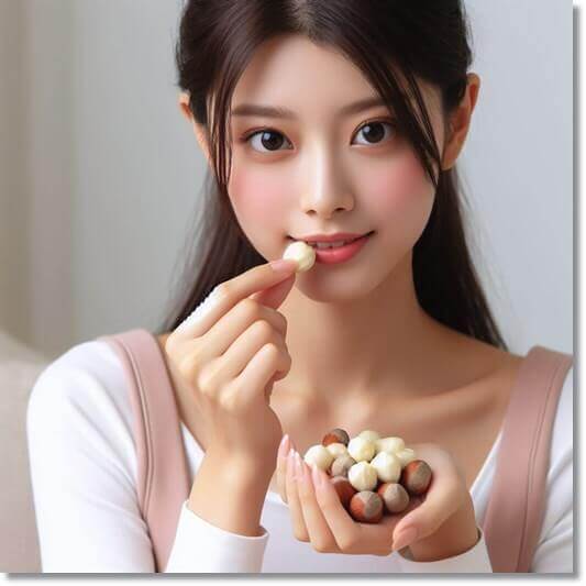 생 헤이즐넛 먹는 여성