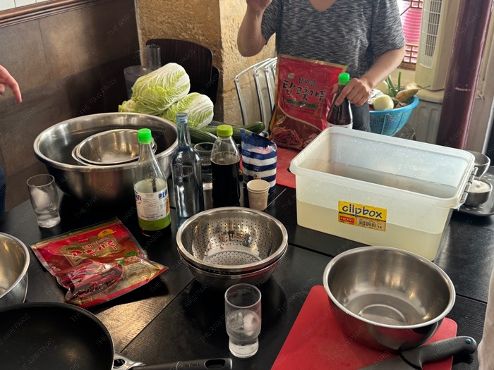 Fresh ingredients for making Kimchi at Paris cooking class, Korean chili powder Gochugaru and seasonings, ingrédients pour kimchi
