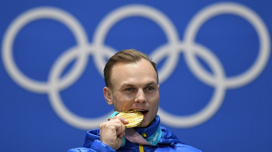 금메달 깨무는 이유