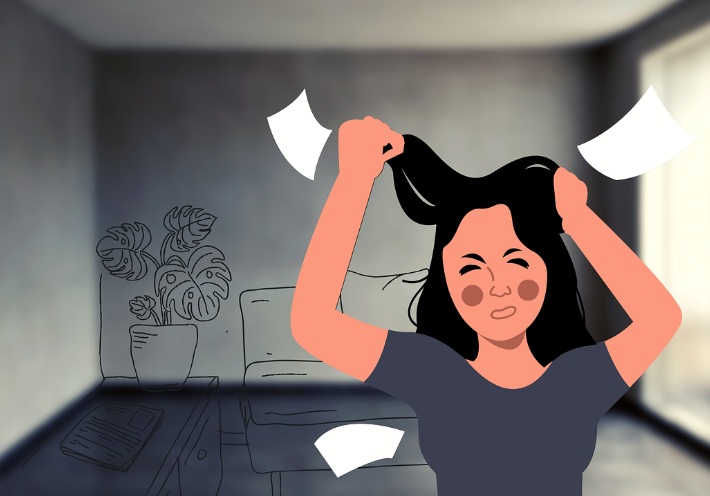 고민으로 머리를 쥐고 있는 사진