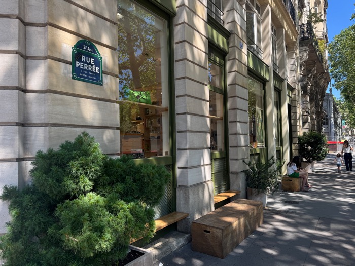 The olive green exterior of The Broken Arm boutique and cafe on Rue Perree in Le Marais Paris ❘ The Broken Arm Paris⁠