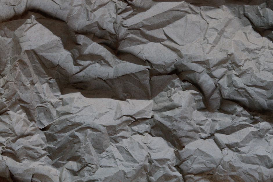Detailed texture of crumpled paper, ideal for backgrounds and design projects.