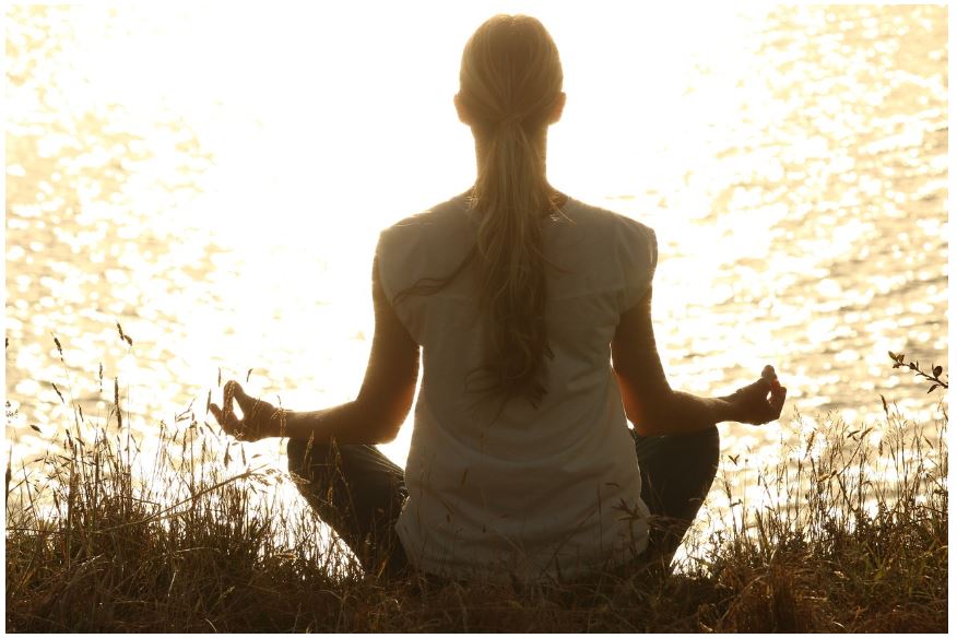 meditation near to water in the light