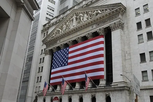 New York Stock Exchange (NYSE) building representing global financial markets.