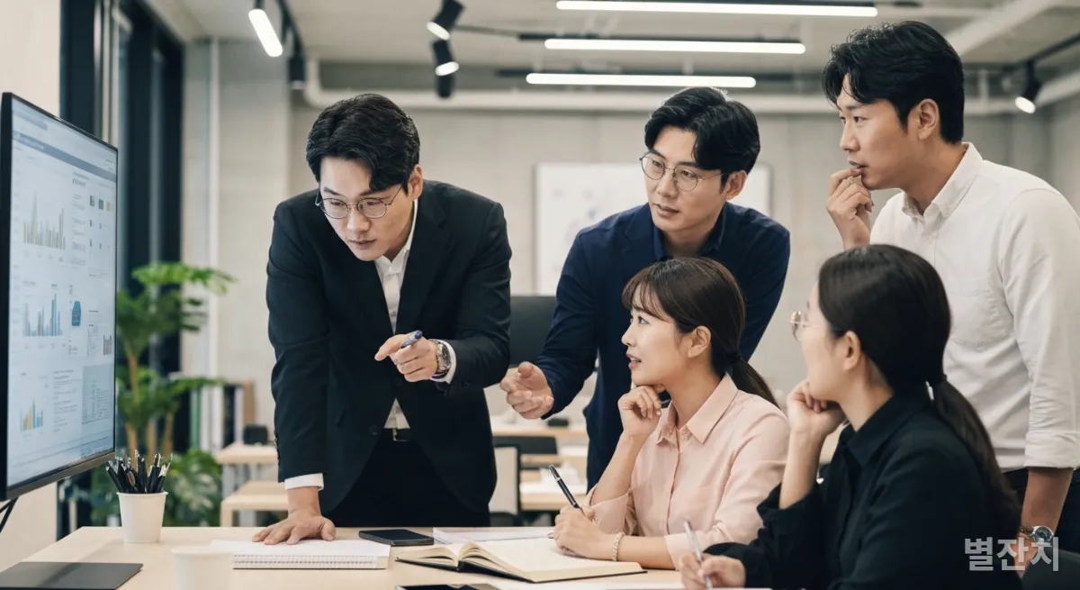 현대적인 사무실에서 AI 코워크를 통해 협업하며 프로젝트를 논의하는 한국인 직장인들