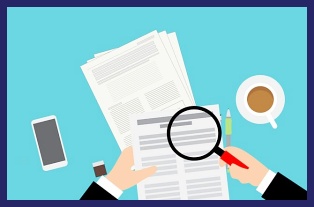 돋보기로 종이를 보는 사람