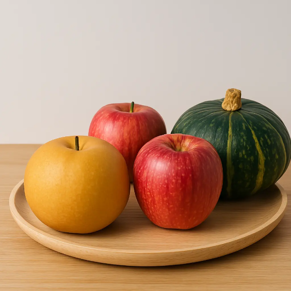 배, 사과, 호박이 놓인 가을 제철 과일 테이블