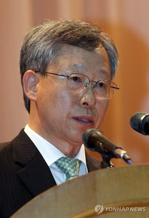 조대현 전 헌법재판관과 노무현 대통령