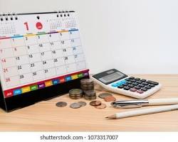 Calculator and calendar on desk