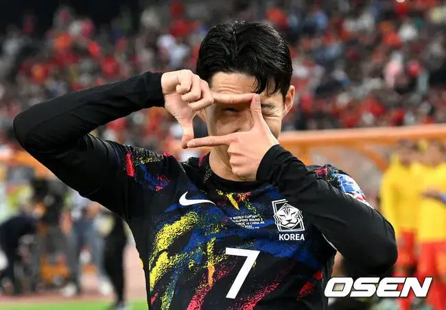 손흥민은 정쯔에게 고개