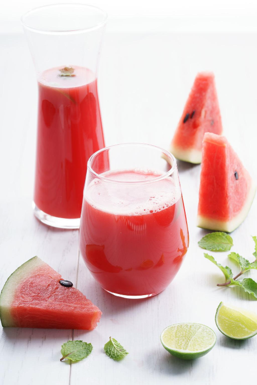 Fresh watermelon mint summer juice in two glass