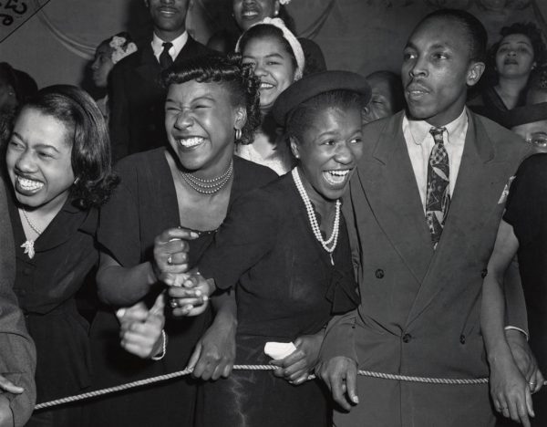 At a concert in Harlem by Weegee