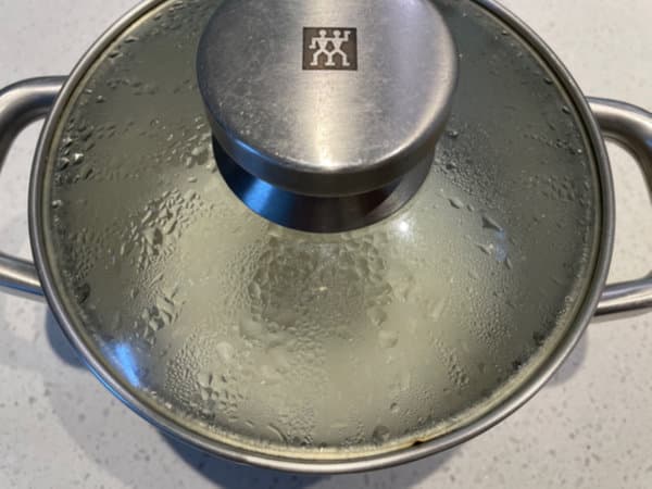 Turn off the heat and let the rice steam with the lid on