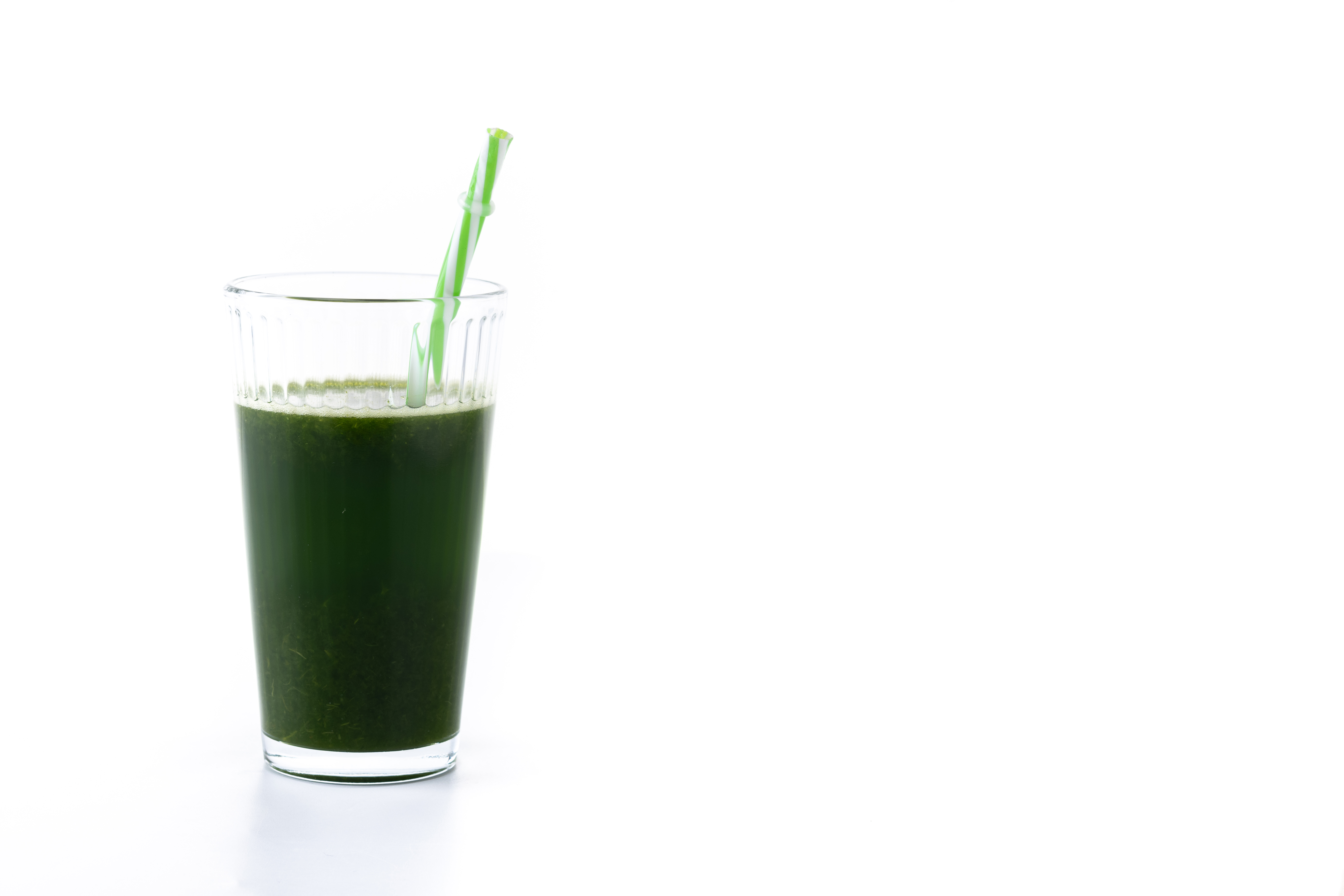 kale-avocado-apples-smoothie-isolated-white-background