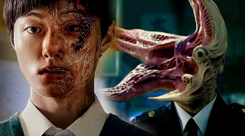 인간의 얼굴이 열리면서 기생생물의 정체가 드러나는 충격적인 장