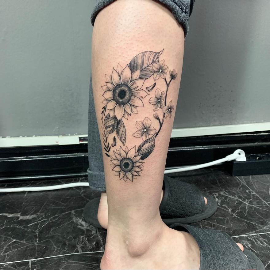 sun flower tattoo
black work