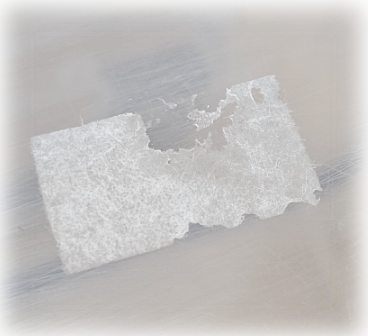 종이테이프 잔여물